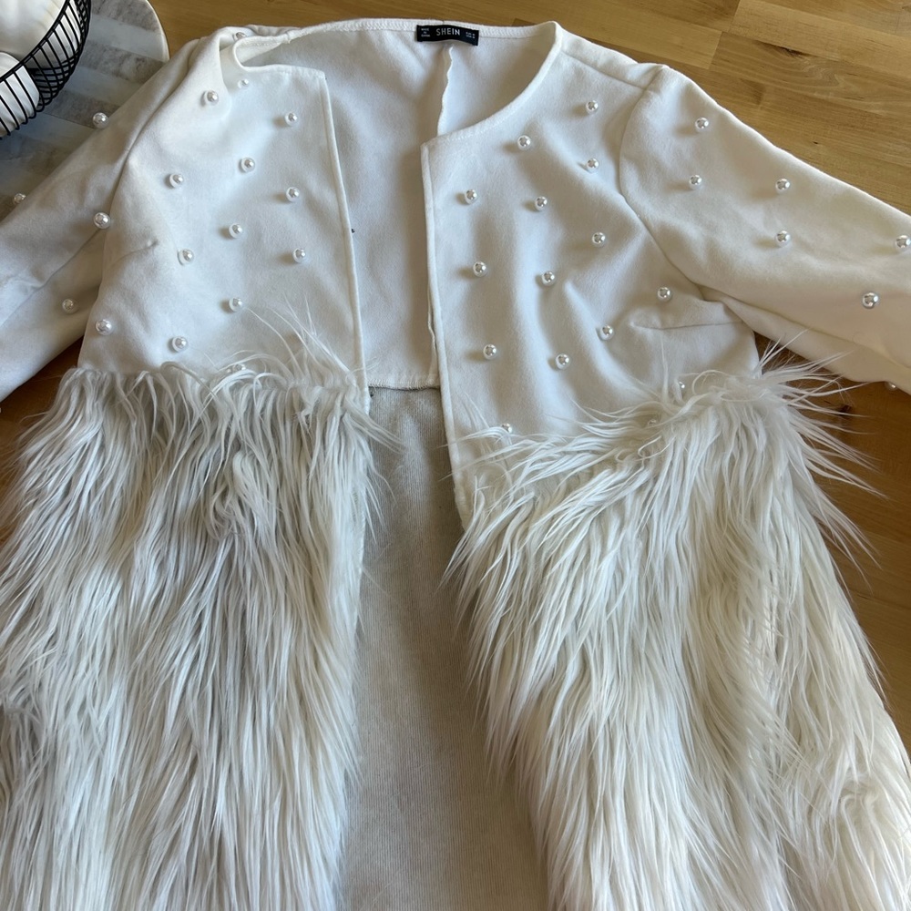 White feather and pearl winter coat